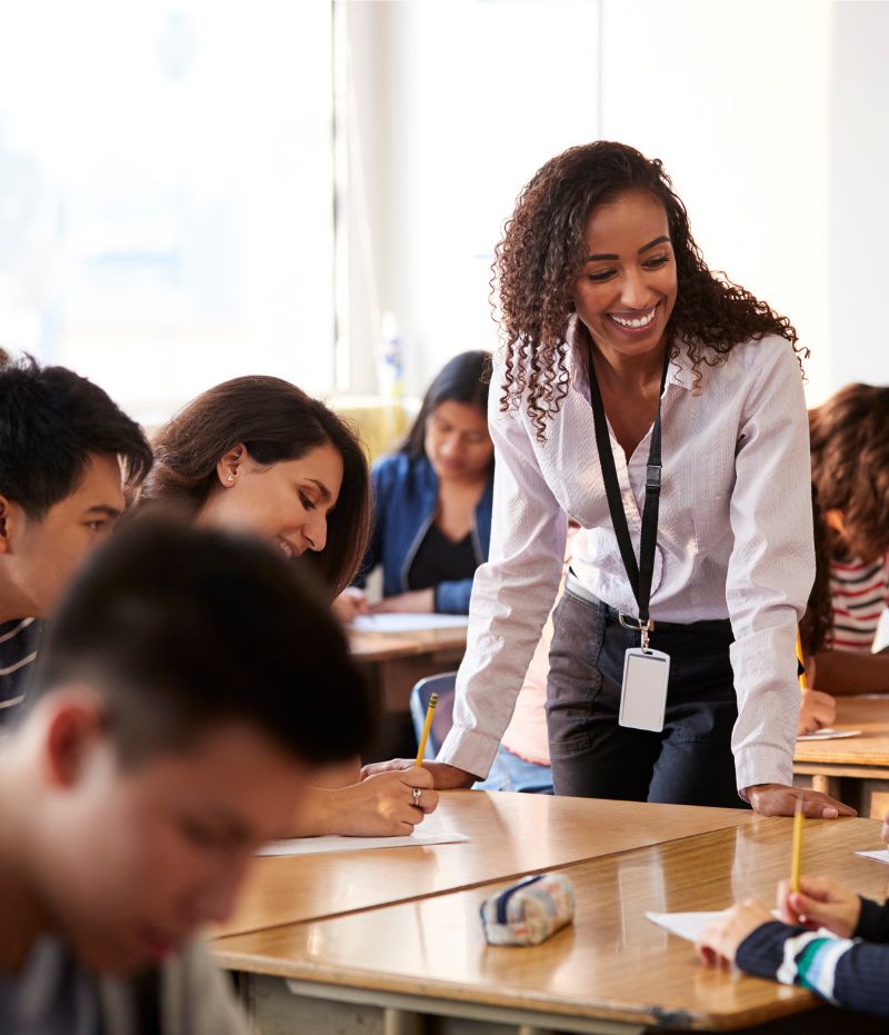 Students learning with teacher