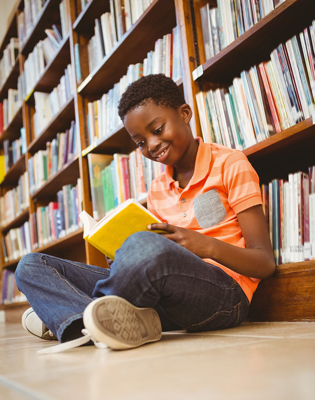 student reading in library